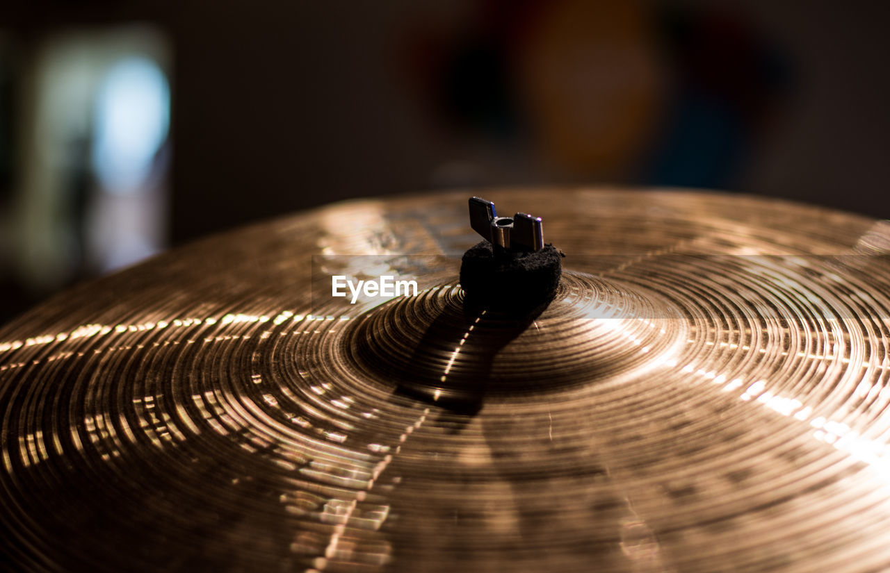 Close-up of cymbal in room