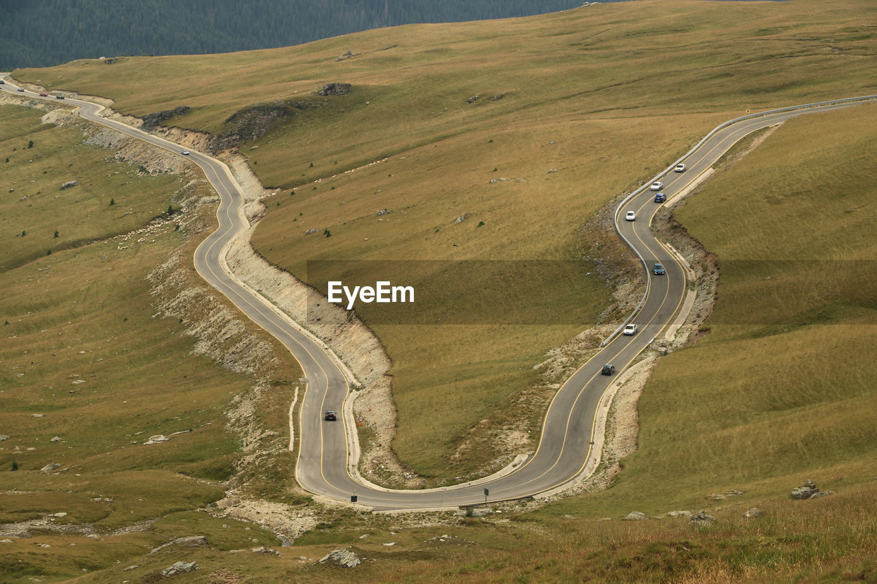 High angle view of winding road on landscape