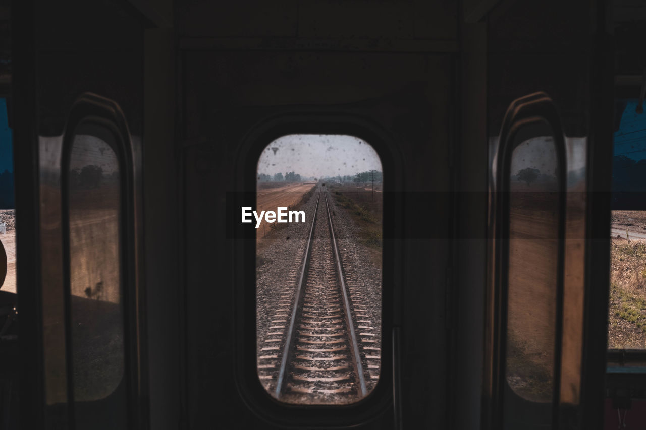 Tracks seen through train window