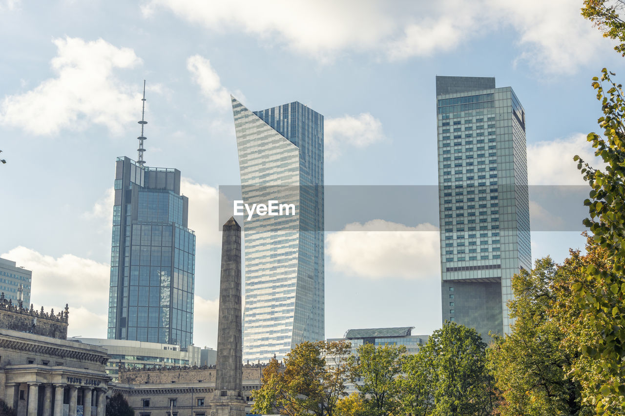 Poland, mazowieckie, warsaw, city center with modern glass skyscrapers