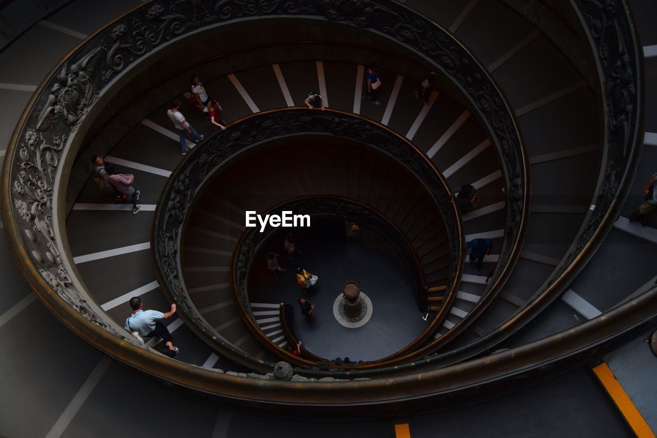 High angle view of people on spiral staircase at vatican museums