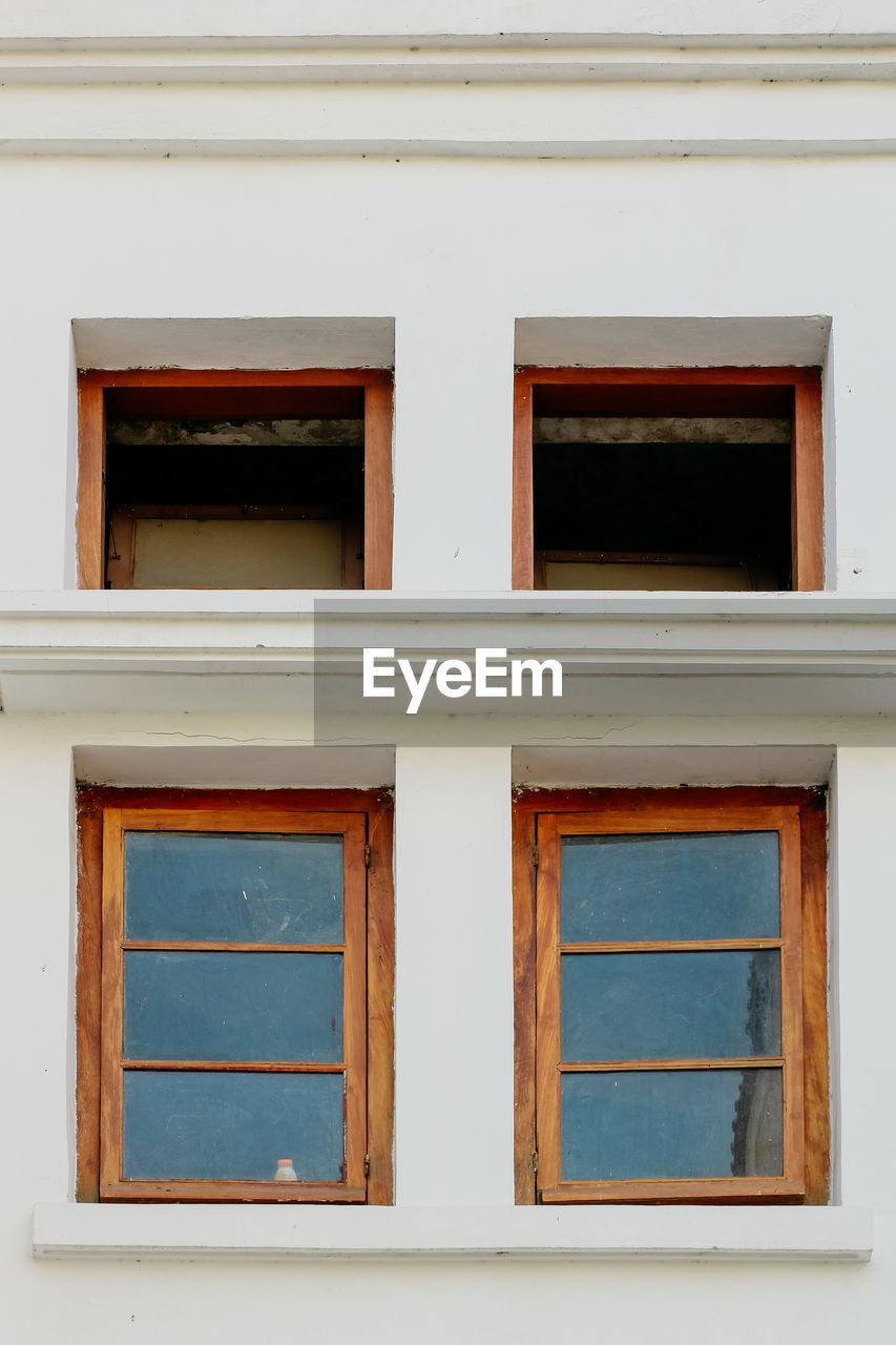 Low angle view of window of house