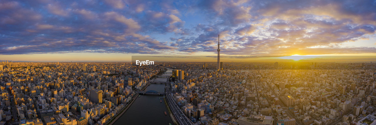 HIGH ANGLE VIEW OF CITY DURING SUNSET