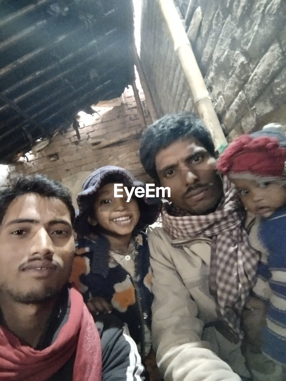 group of people, men, portrait, adult, looking at camera, togetherness, young adult, women, smiling, day, leisure activity, person, human face, winter, female, child, friendship, emotion, happiness, lifestyles, temple, outdoors, clothing, nature, bonding, architecture, childhood, warm clothing, casual clothing, waist up, front view, looking, standing