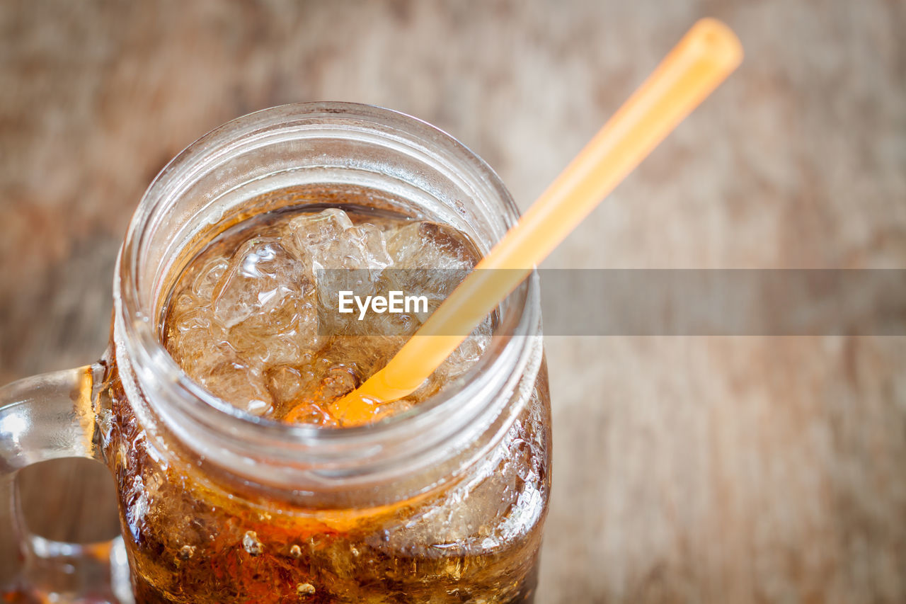 Close-up of drink in jar on table