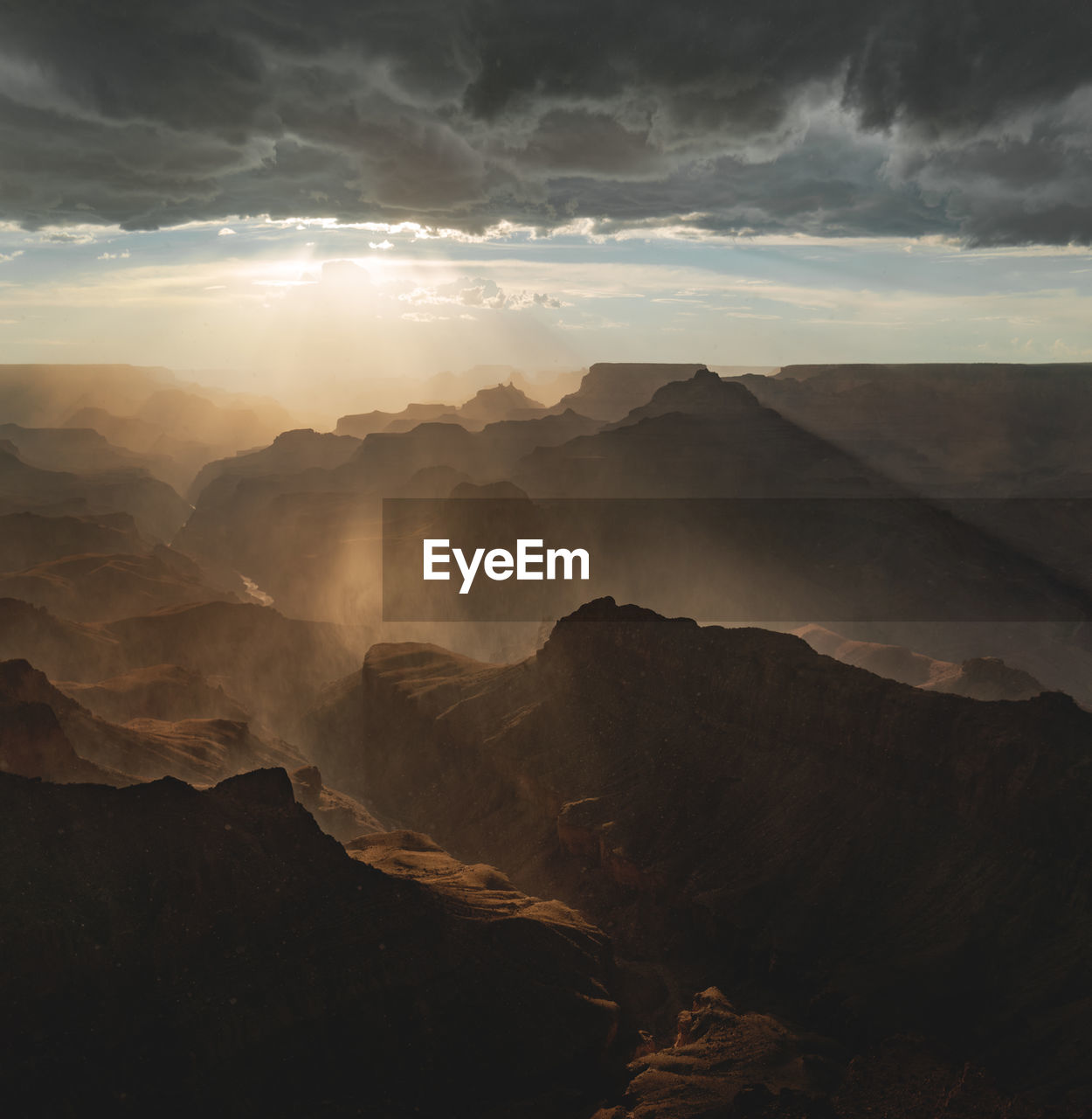 Scenic view of mountains against sky during sunset