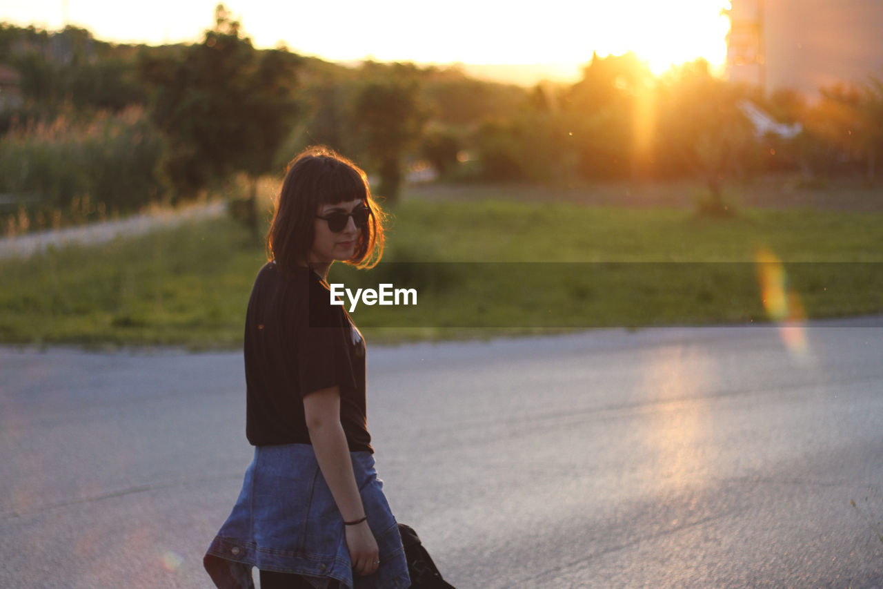 Young woman on road