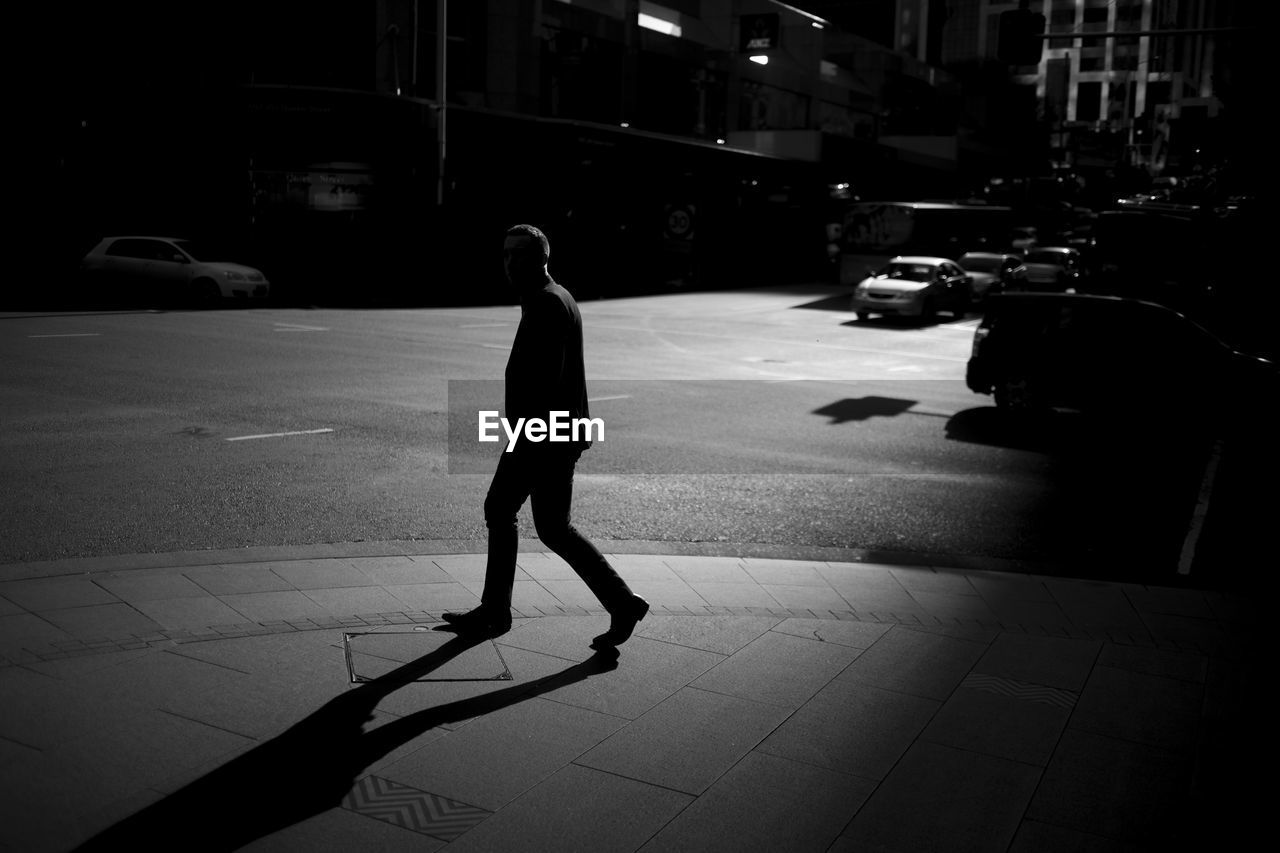 PERSON WALKING ON STREET