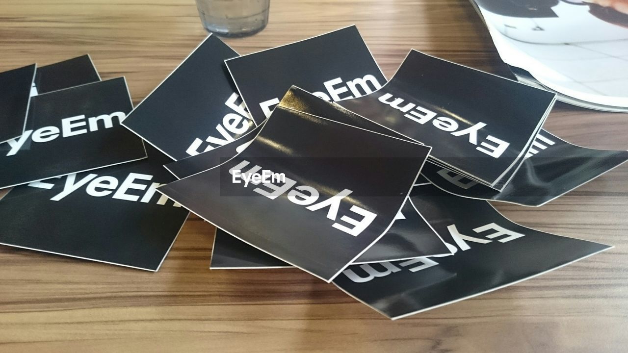 High angle view of eyeem papers on table