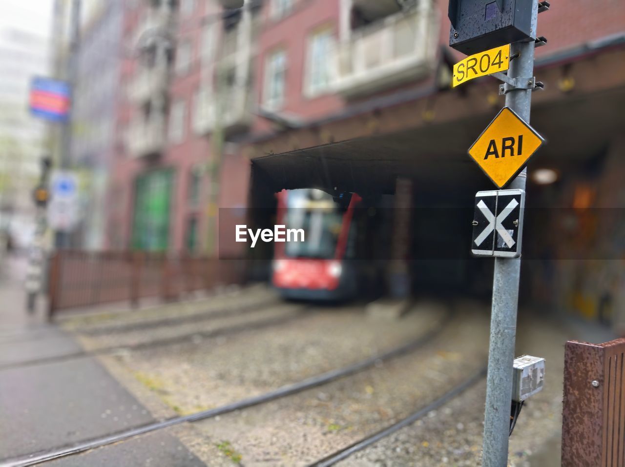 Information sign on railroad track in city