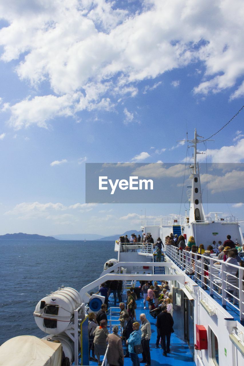 High angle view of people in cruise ship against sky