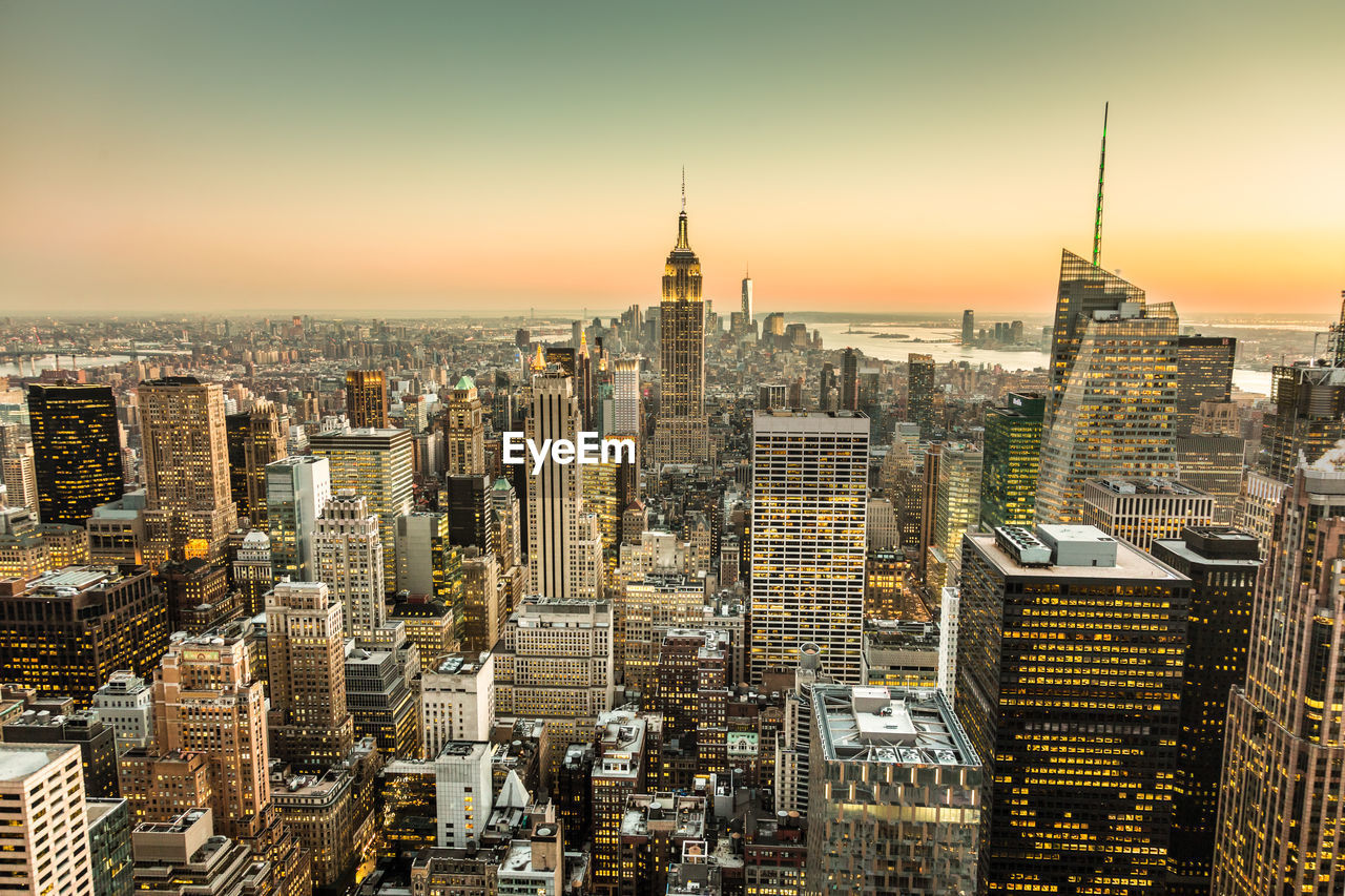 AERIAL VIEW OF CITY BUILDINGS DURING SUNSET