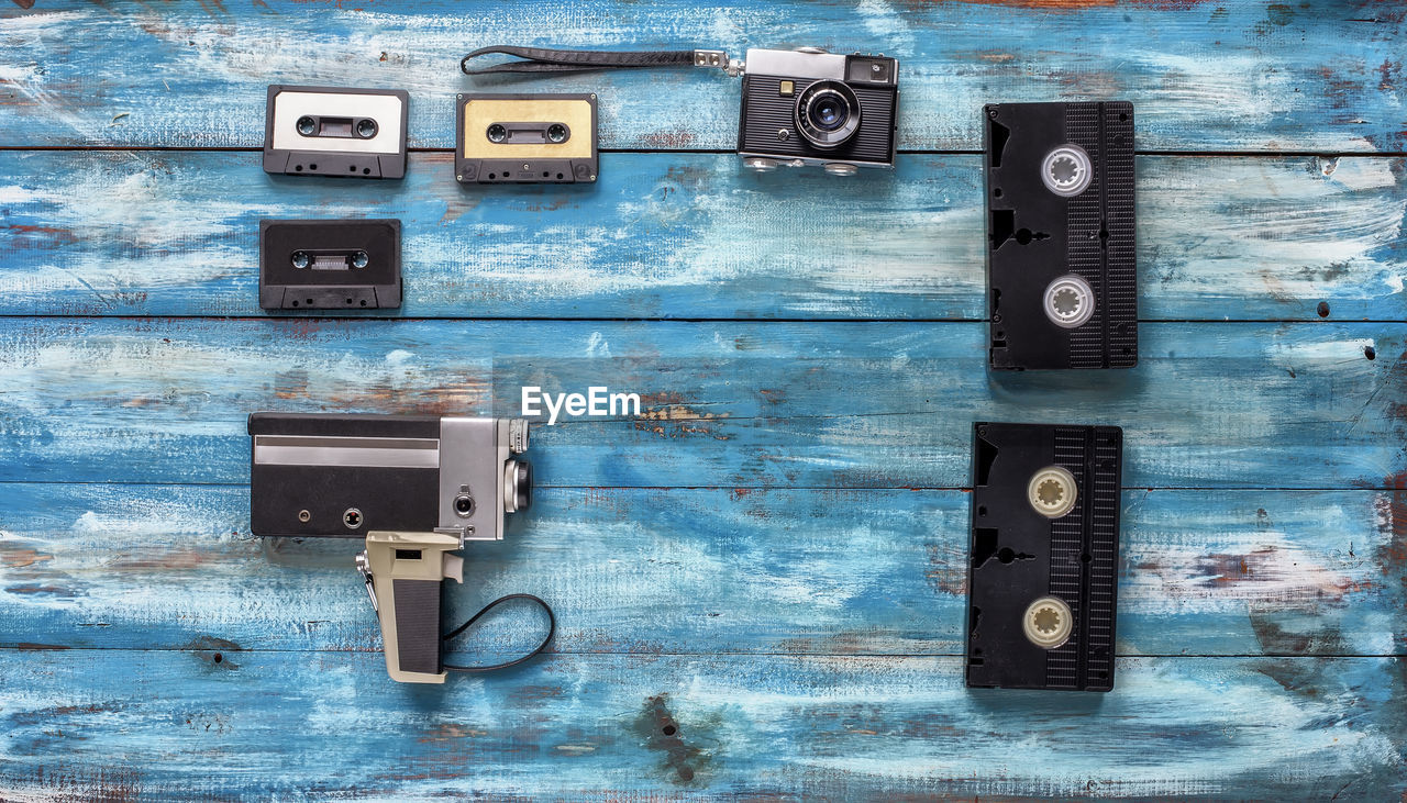 Directly above shot of audio cassettes on wooden table