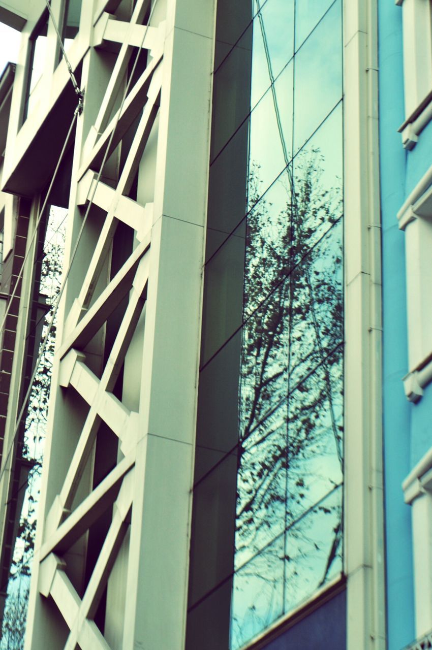 LOW ANGLE VIEW OF MODERN BUILDINGS