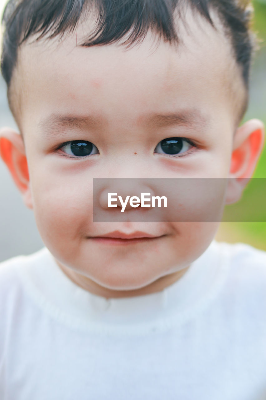 Close-up portrait of cute boy