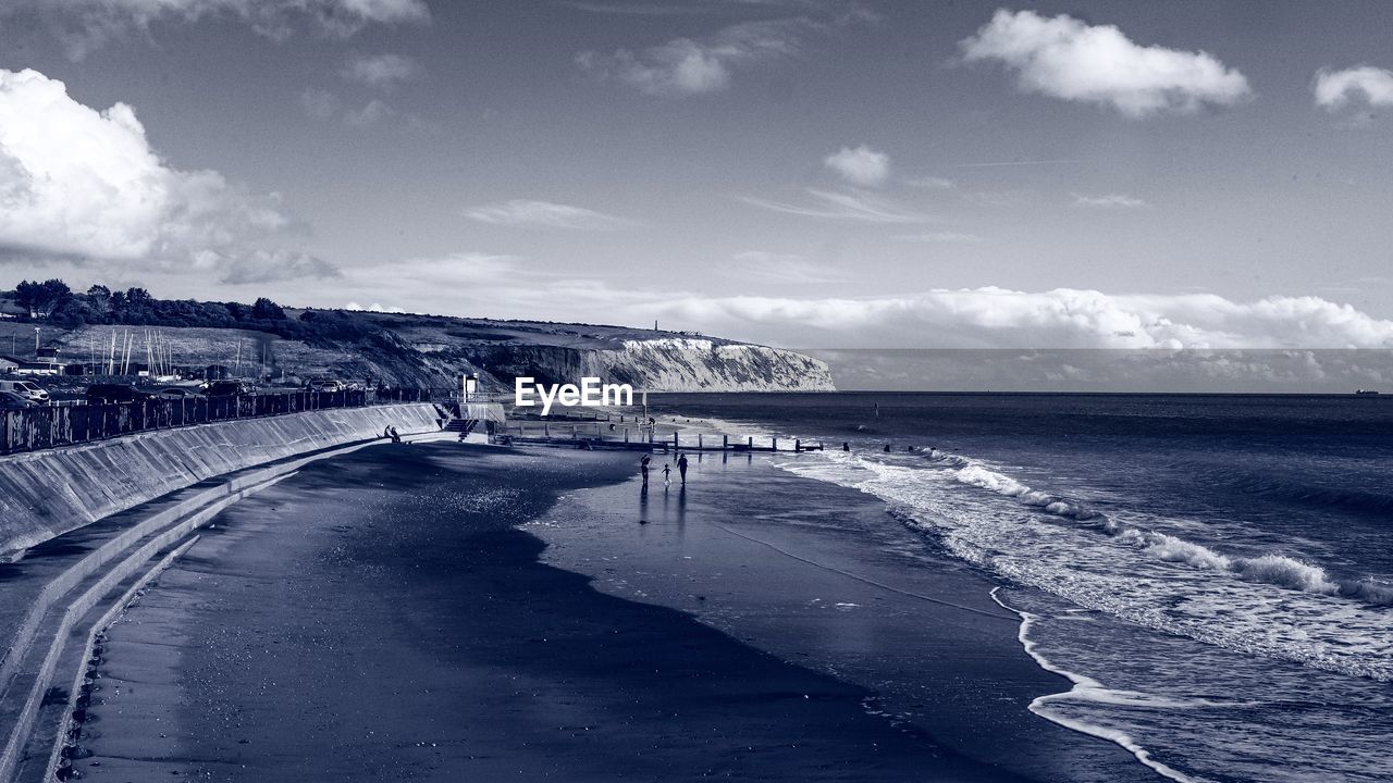 VIEW OF BEACH AGAINST SKY