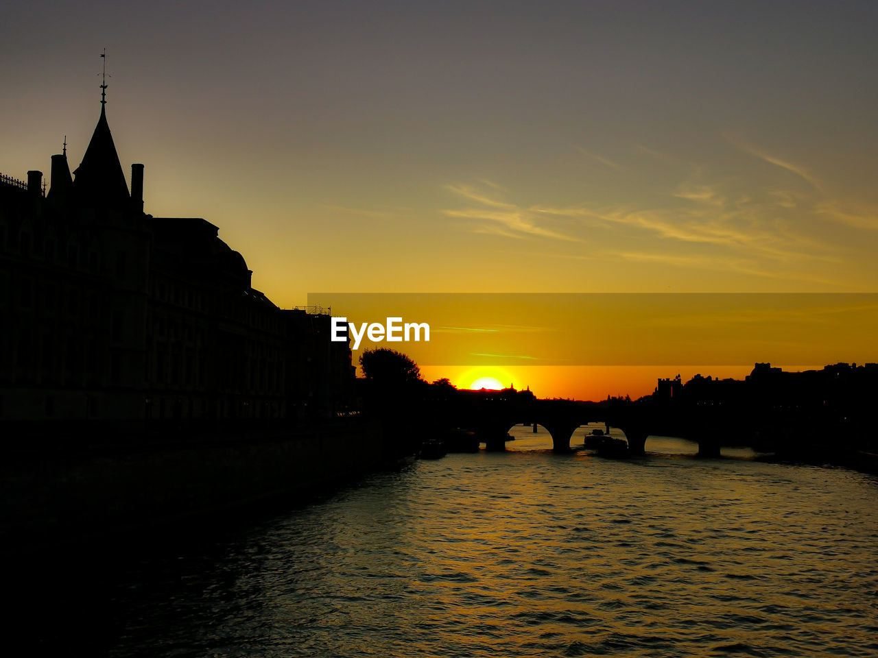 SILHOUETTE OF BUILDINGS AT SUNSET