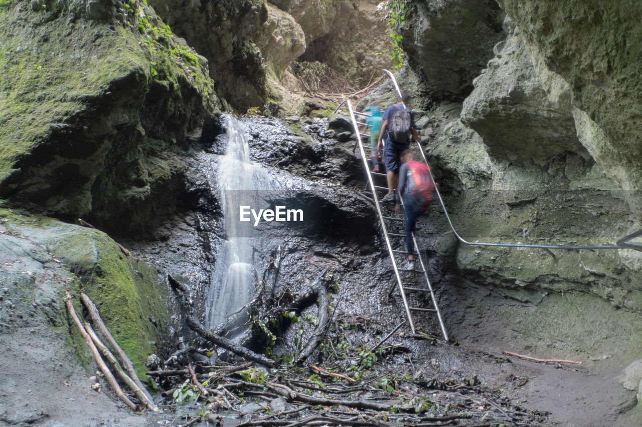 SCENIC VIEW OF WATERFALL