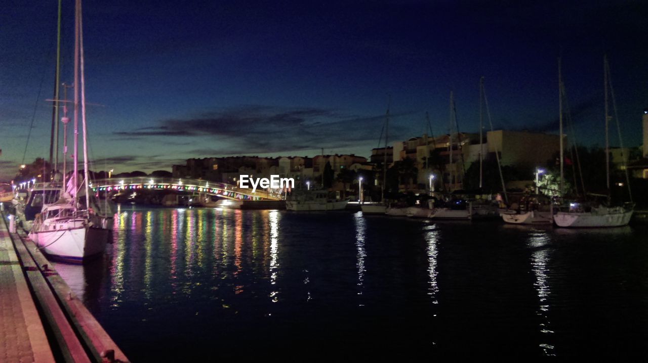 VIEW OF HARBOR AT NIGHT