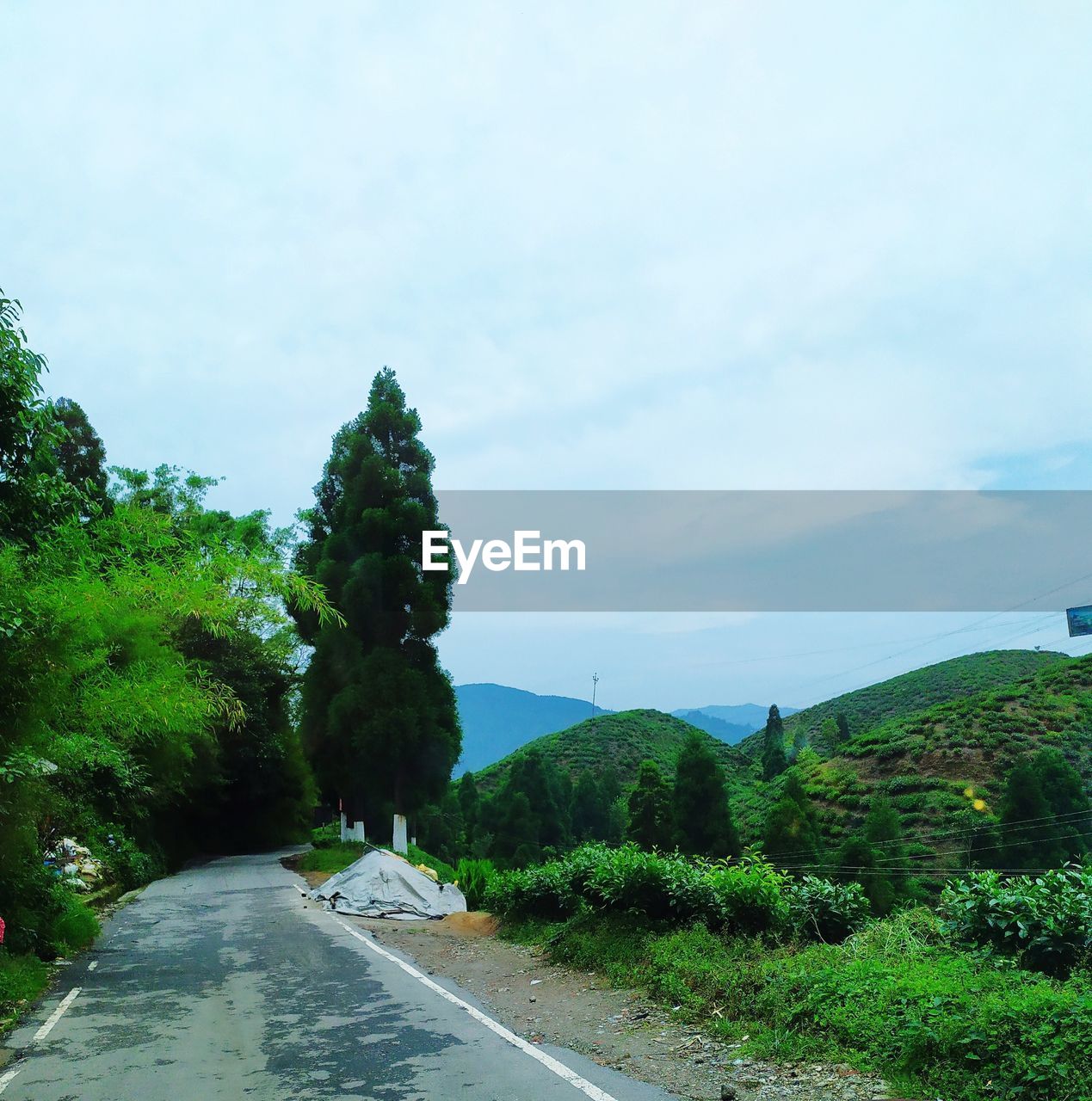 EMPTY ROAD AGAINST SKY