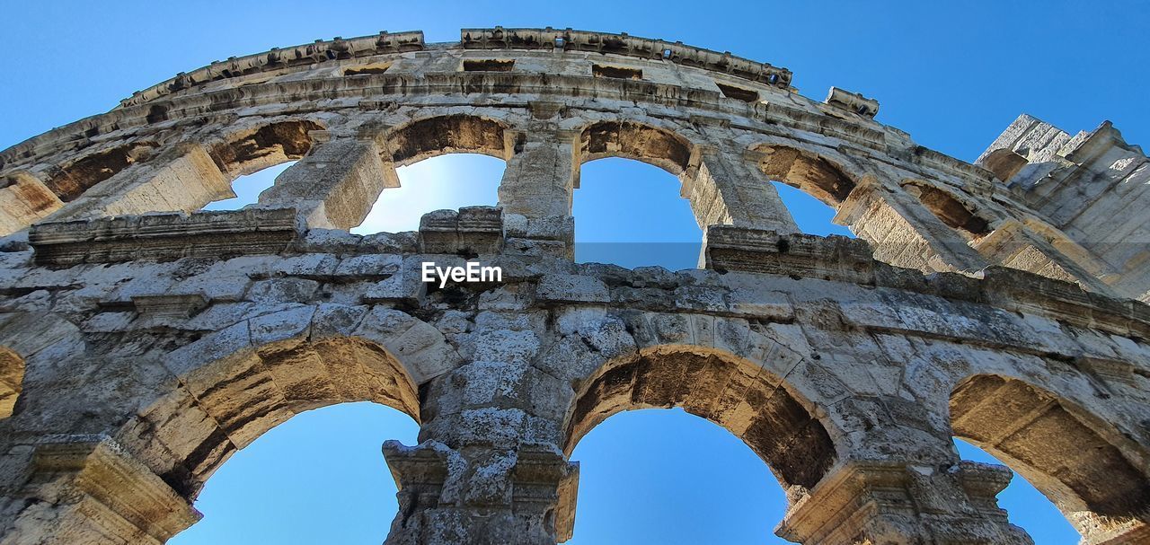 Low angle view of historical building against sky