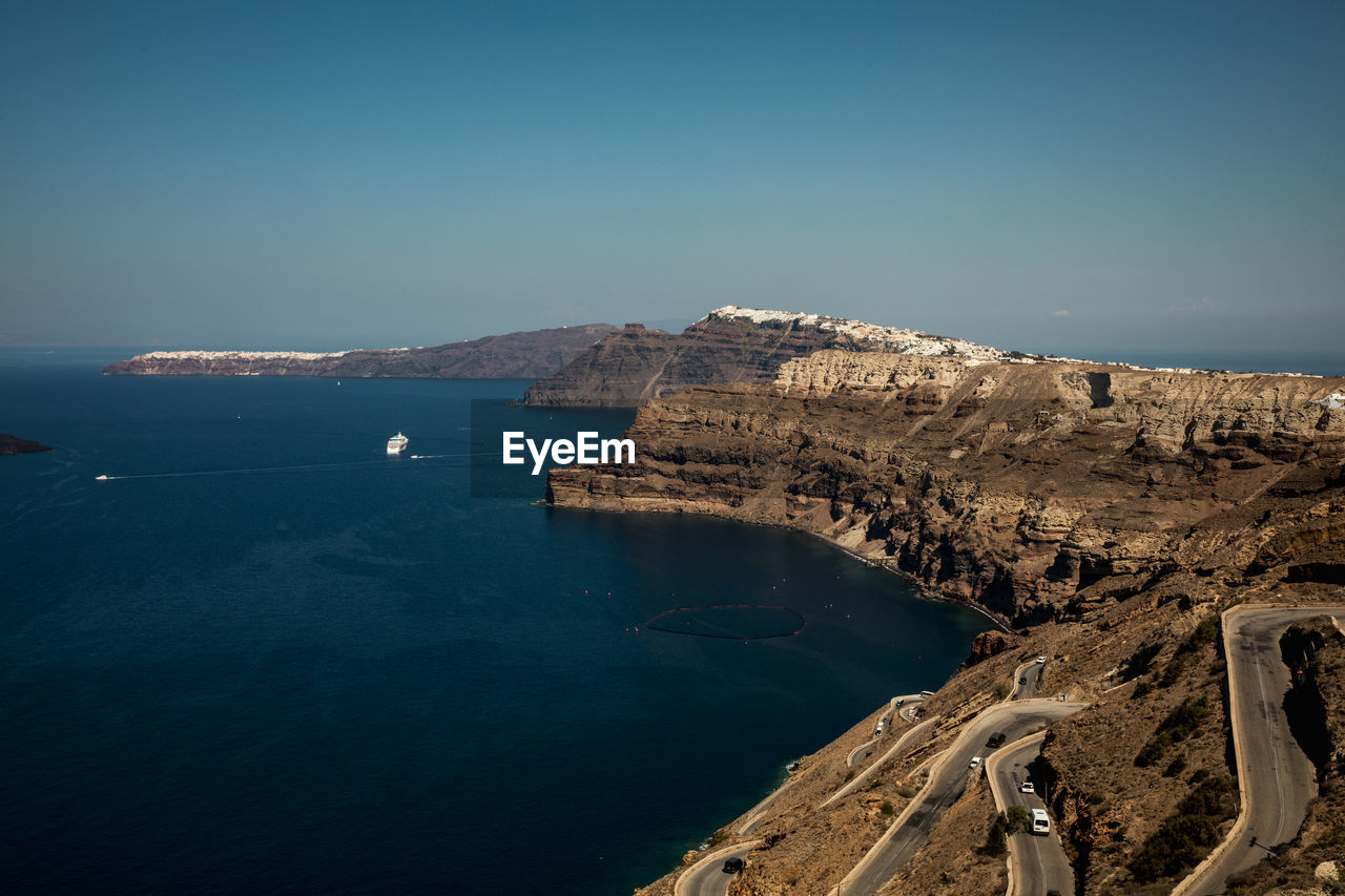 Scenic view of sea against clear blue sky