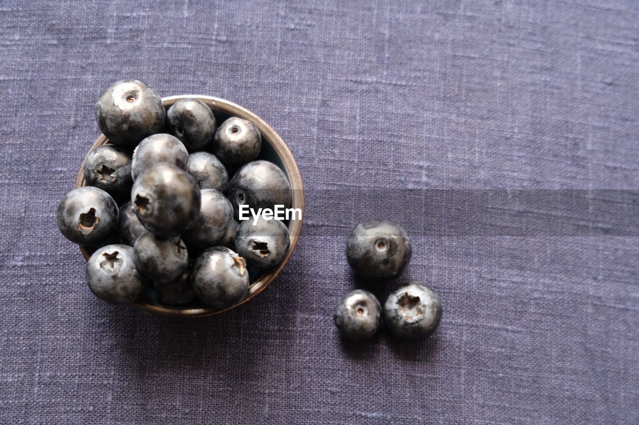 High angle view of blueberry fruit on table