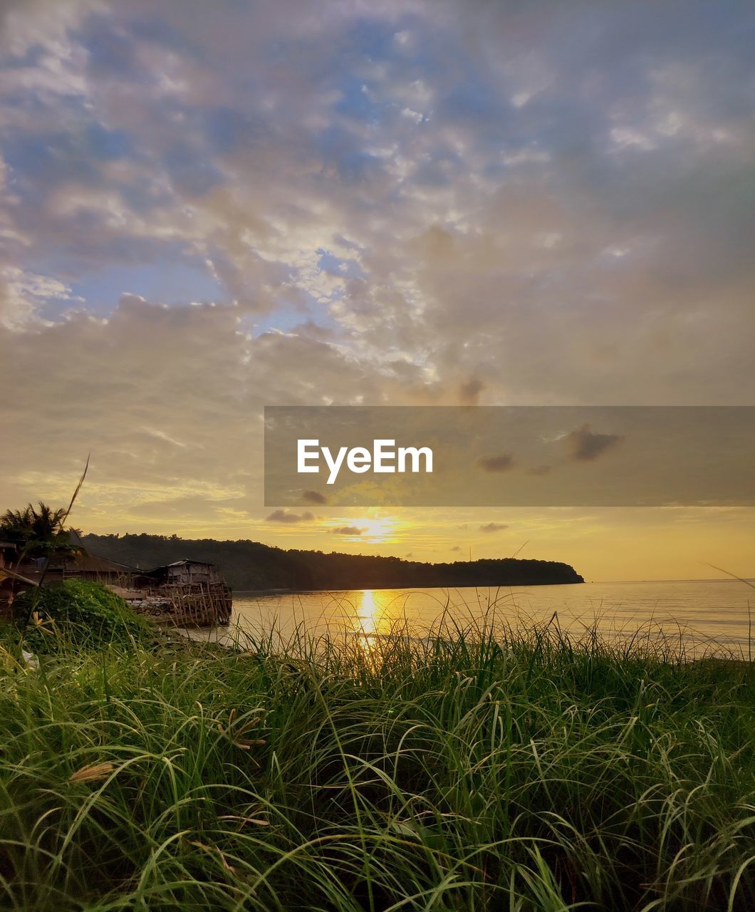 SCENIC VIEW OF SEA DURING SUNSET