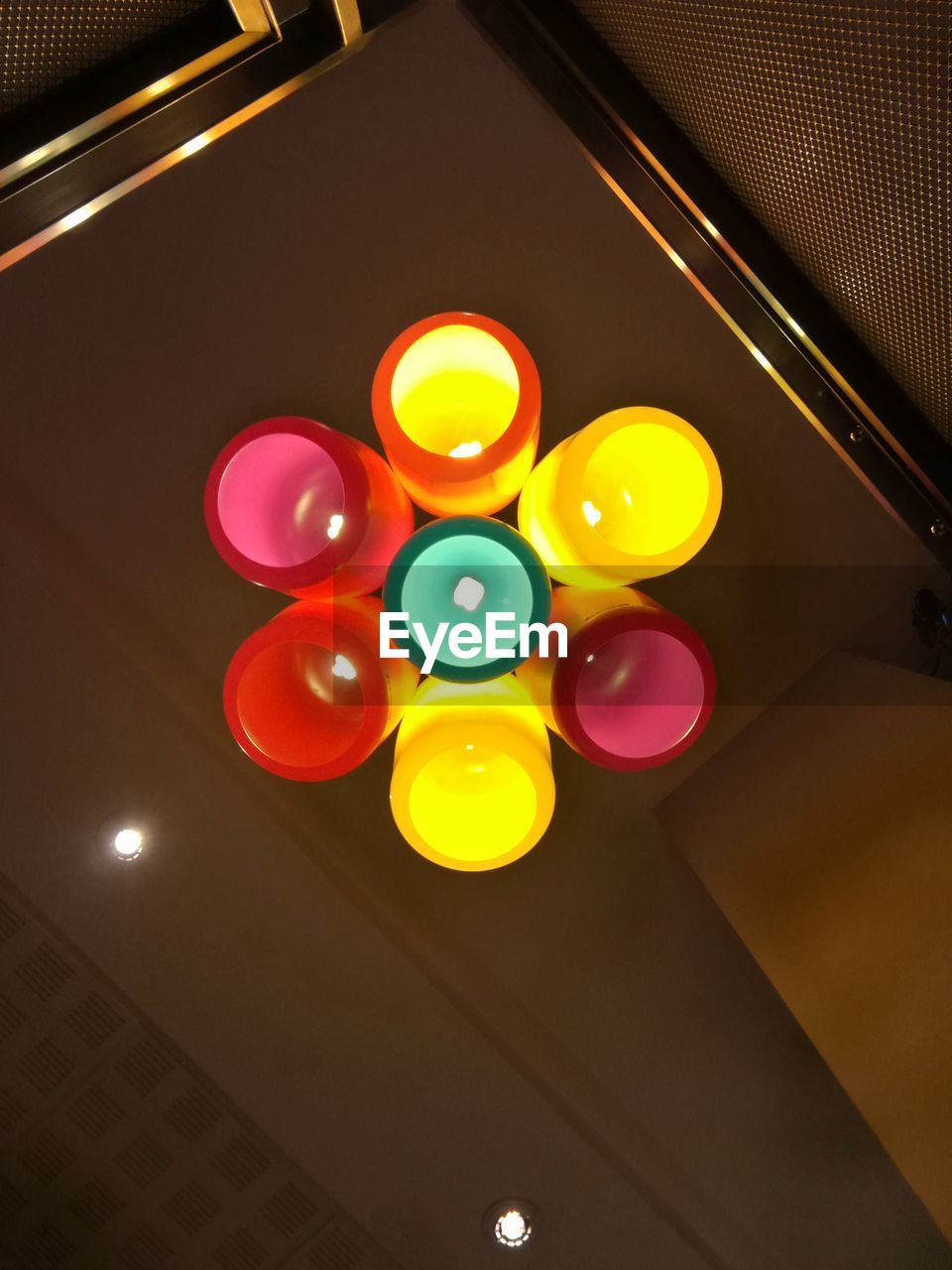 HIGH ANGLE VIEW OF ILLUMINATED CHRISTMAS LIGHTS ON TABLE AT NIGHT