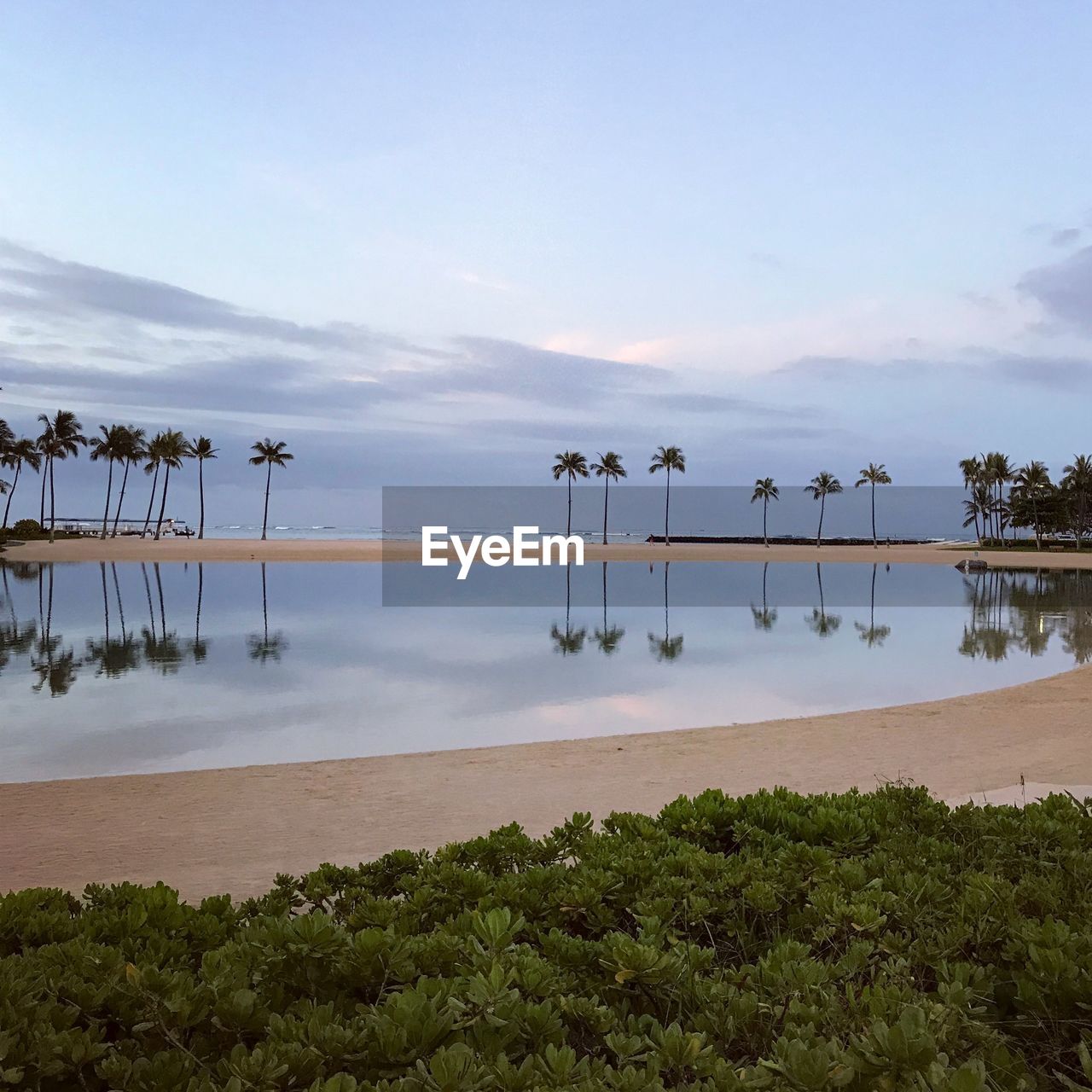 Scenic view of beach against sky