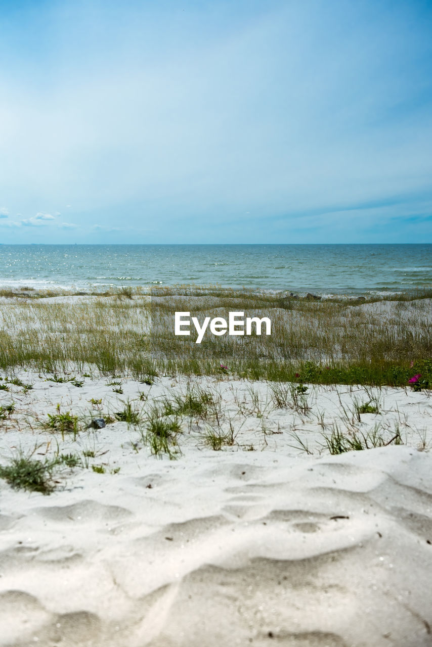 Scenic view of beach against sky