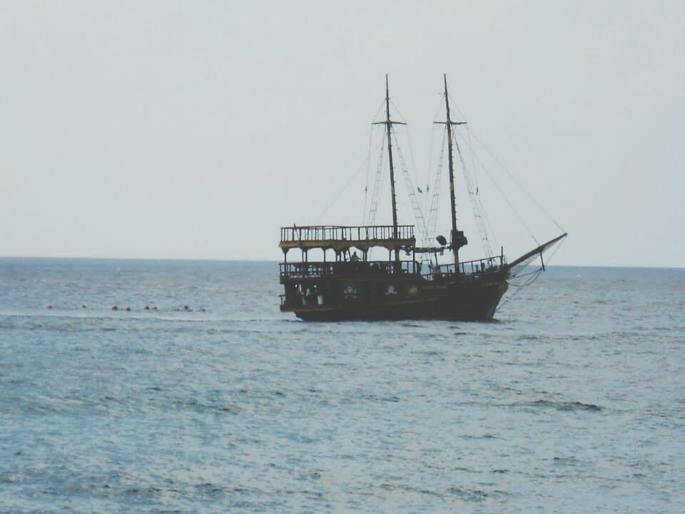 SAILBOAT SAILING IN SEA