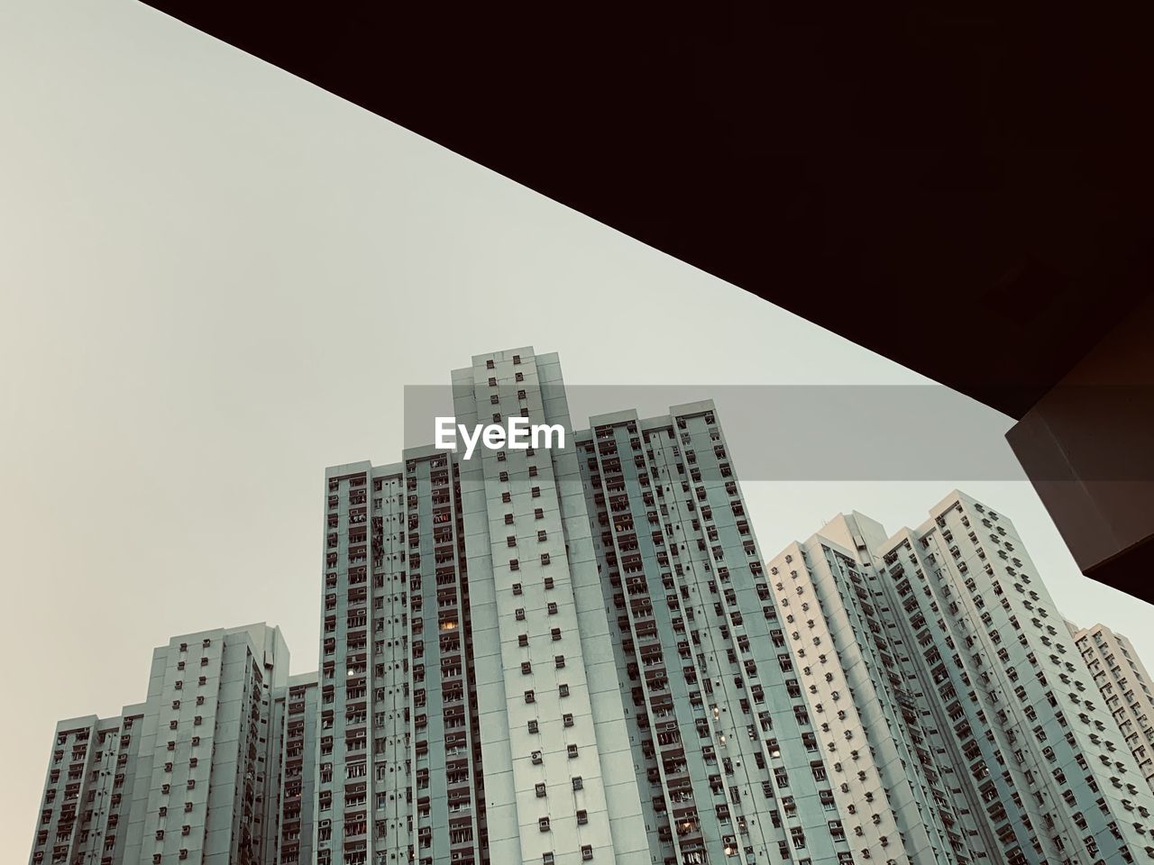 Low angle view of modern buildings against clear sky