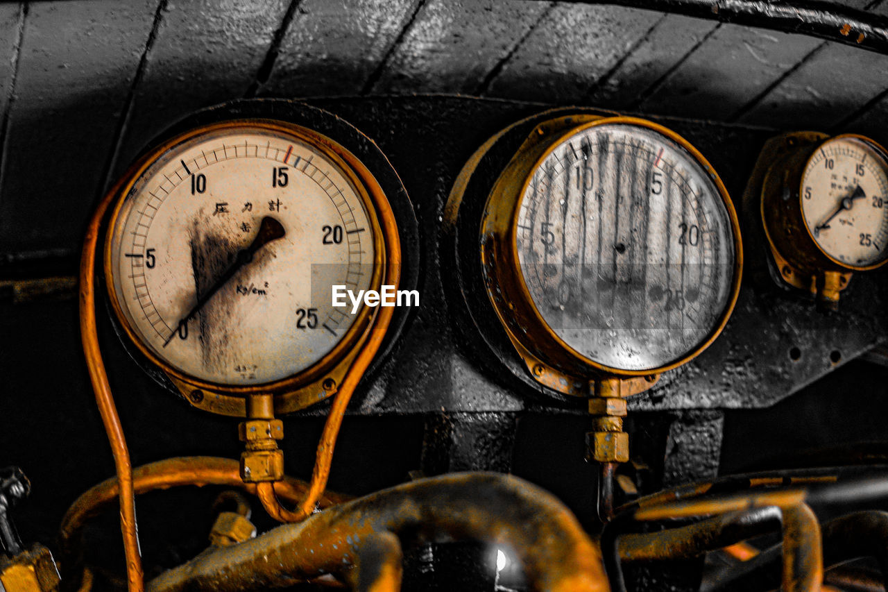 Close-up of gauge in vintage locomotive