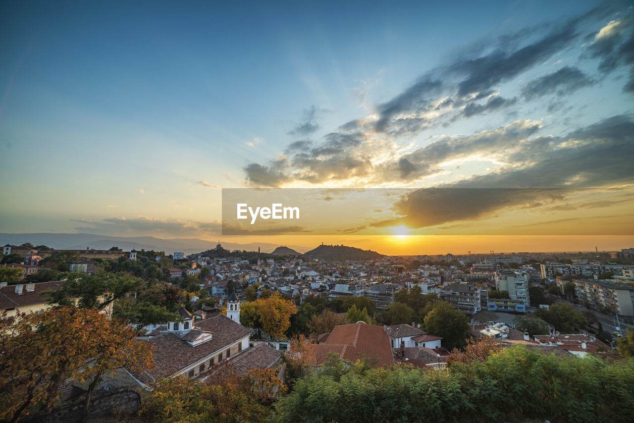 High angle view of townscape against sky during sunset