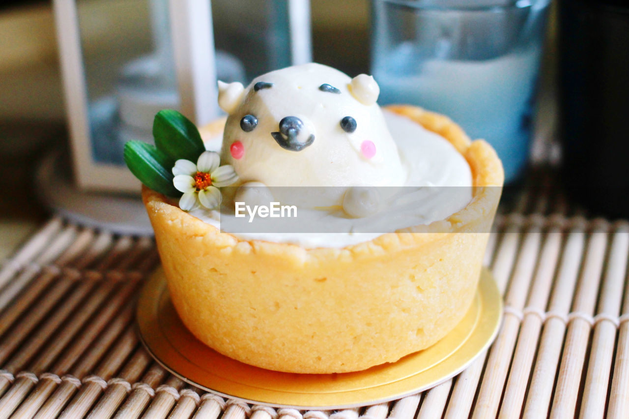 food, food and drink, dessert, sweet food, sweet, cake, no people, dairy, produce, indoors, freshness, icing, dish, close-up, temptation, cuisine, business, focus on foreground, table, animal representation, sweetness