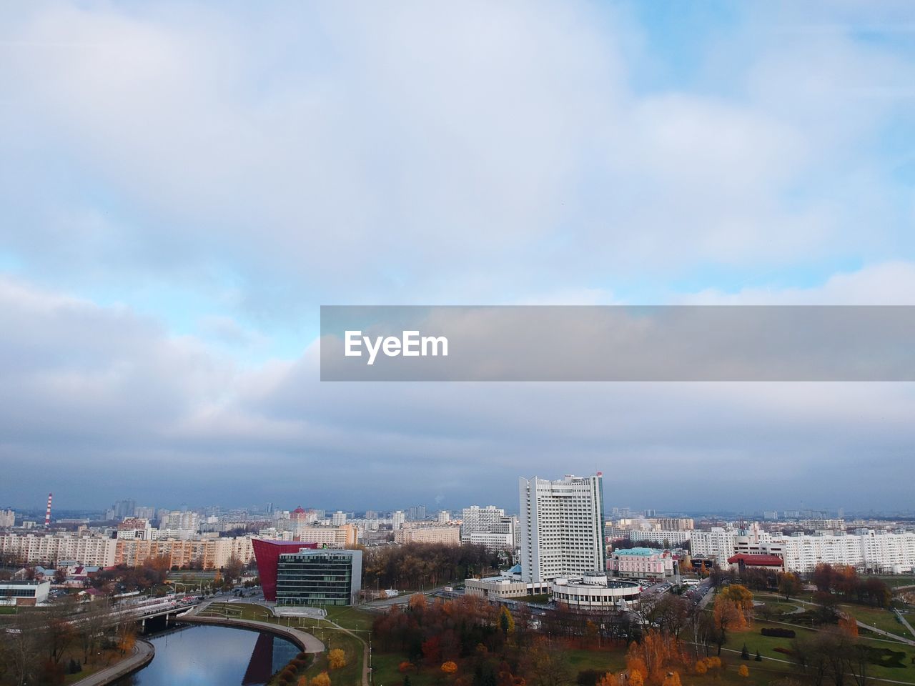 HIGH ANGLE VIEW OF CITY BUILDINGS AGAINST SKY