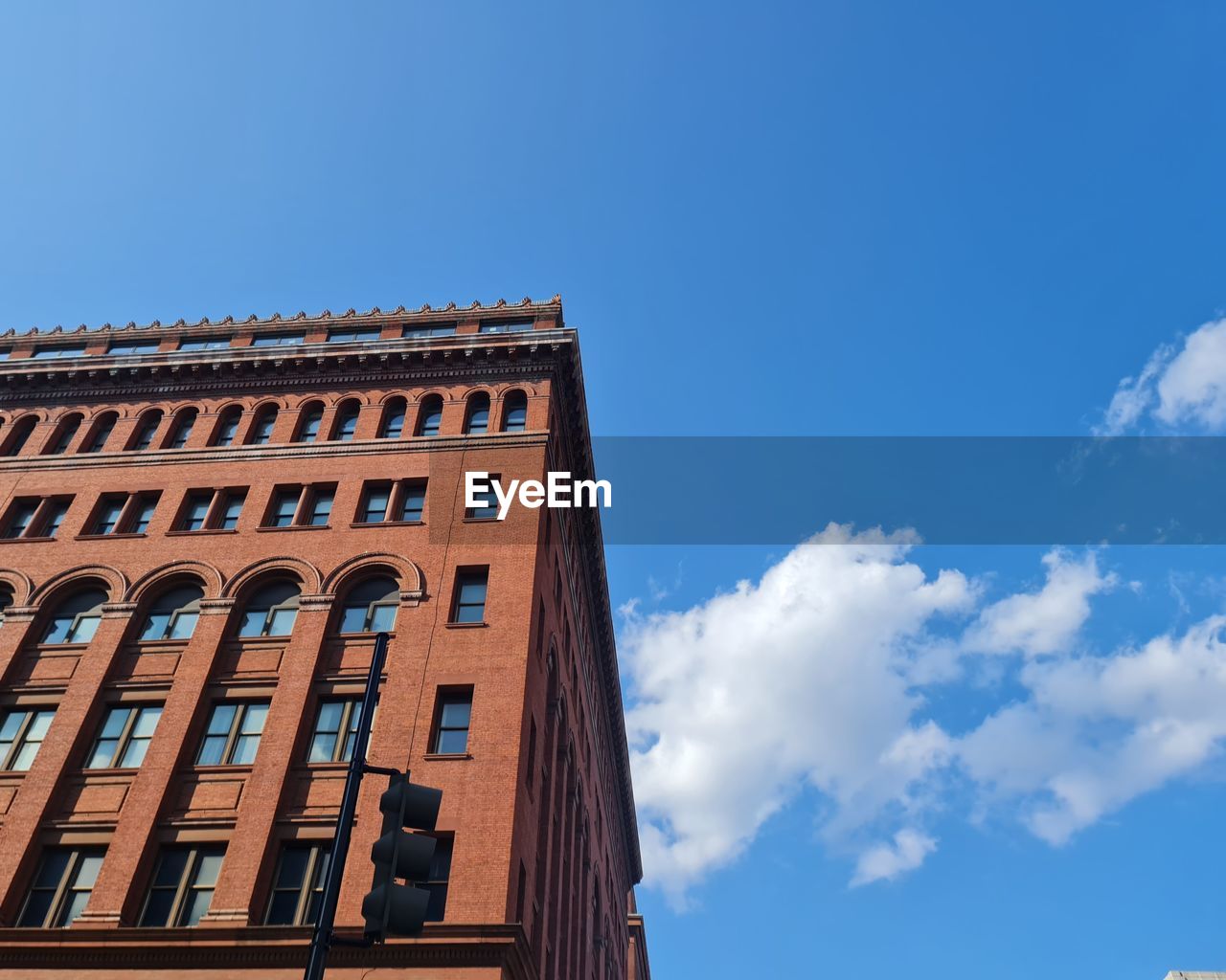 architecture, sky, building exterior, built structure, landmark, blue, building, low angle view, cloud, window, city, nature, urban area, downtown, no people, skyscraper, tower block, day, outdoors, residential district, copy space, history, cityscape, the past, travel destinations, facade