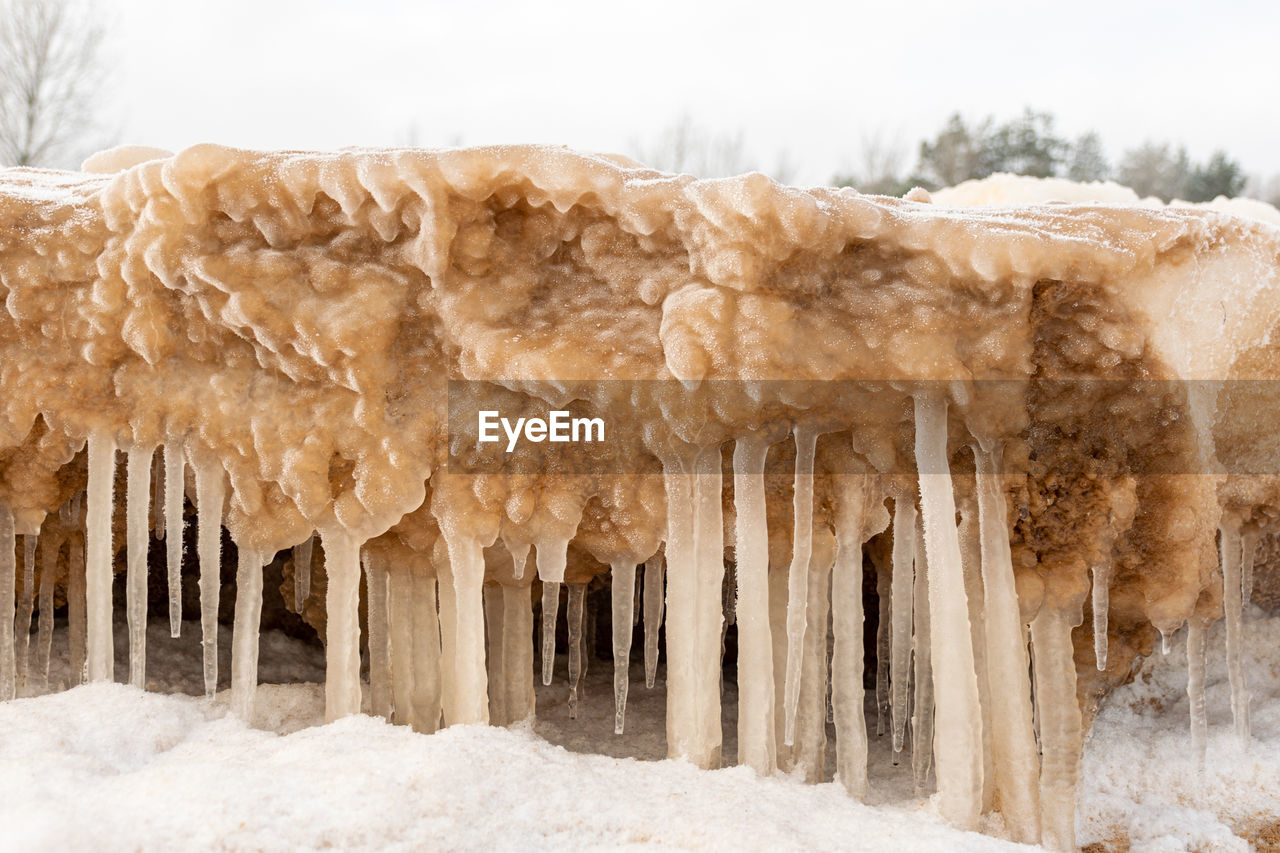 cold temperature, winter, snow, cave, frozen, ice, nature, formation, environment, no people, landscape, speleothem, beauty in nature, icicle, freezing, stalagmite, outdoors, land, rock, scenics - nature, day, non-urban scene, geology