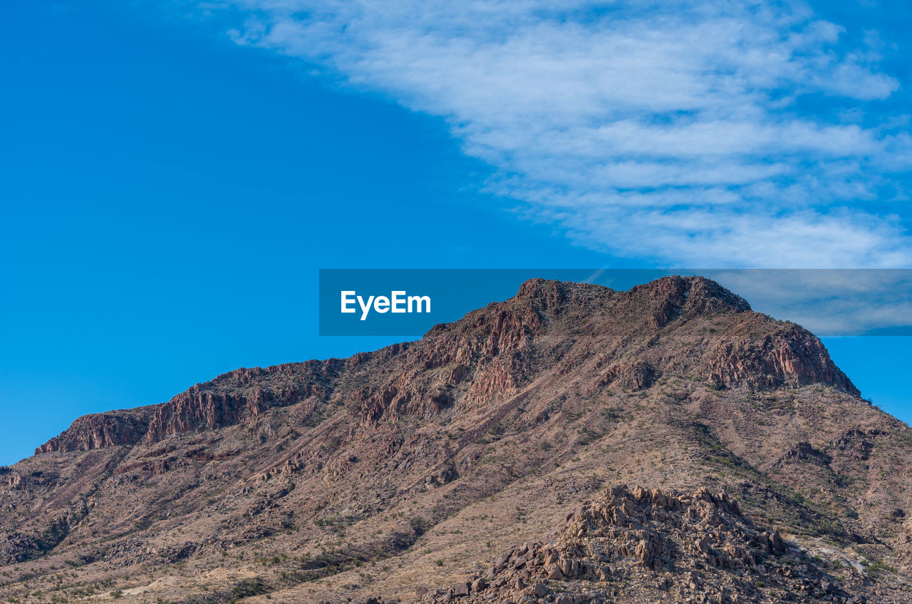 Low angle landscape of almost barren hillside near kingman, arizona