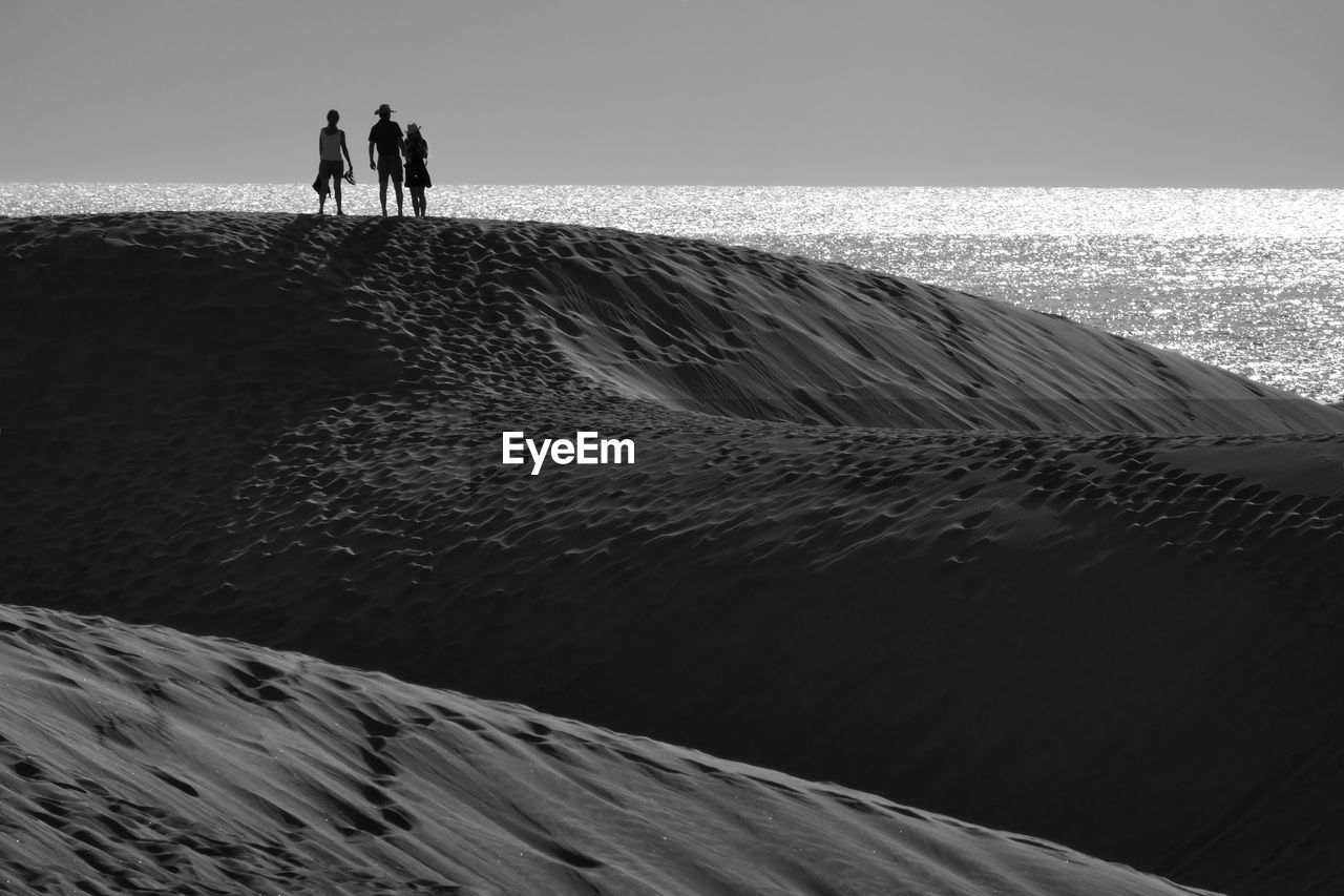 PEOPLE ON BEACH