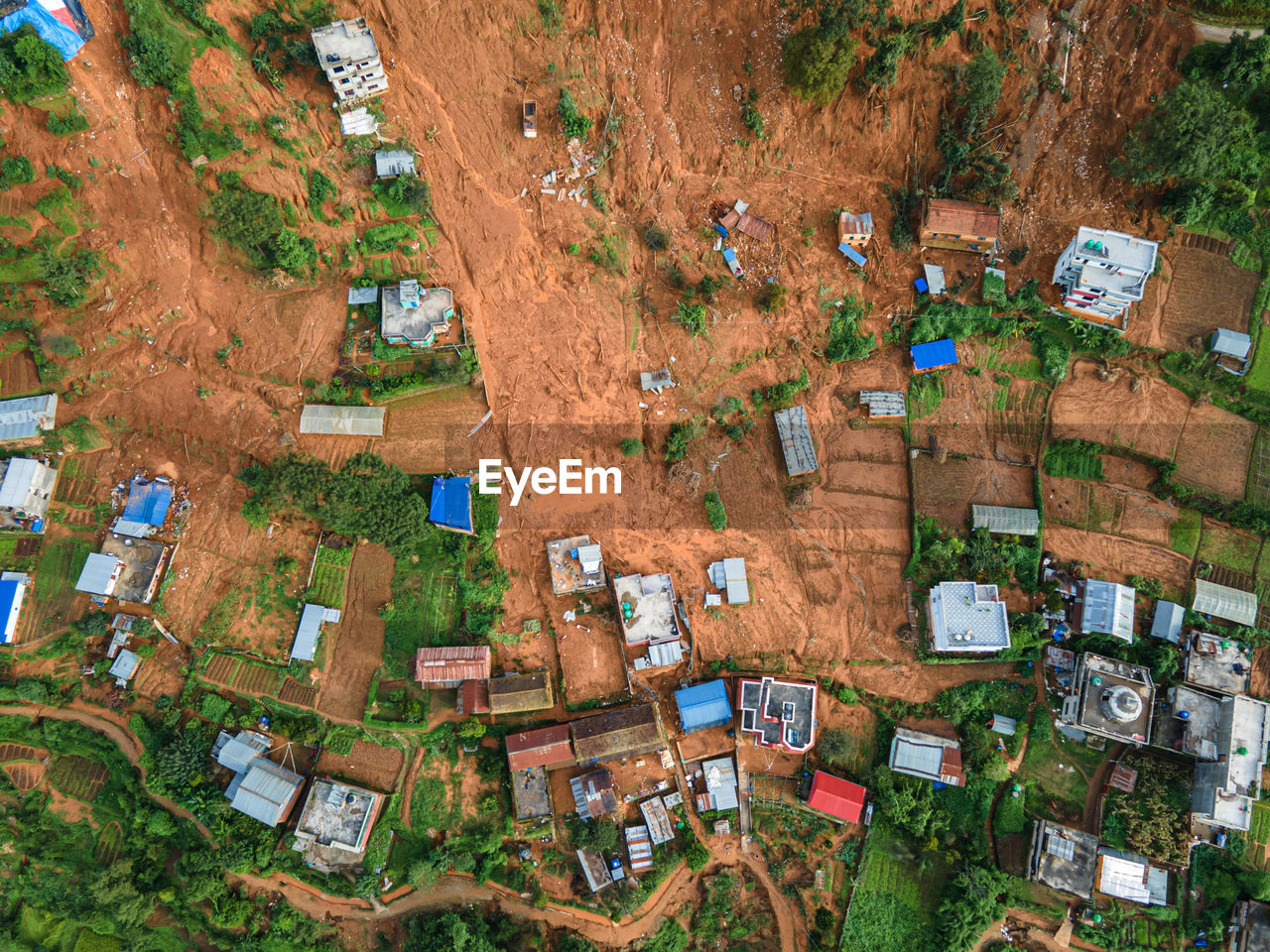 aerial photography, high angle view, bird's-eye view, residential area, architecture, aerial view, environment, neighbourhood, town, city, landscape, land, no people, nature, built structure, building, building exterior, plant, day, outdoors, tree, roof, house, suburb, travel, transportation, rural scene, village, travel destinations