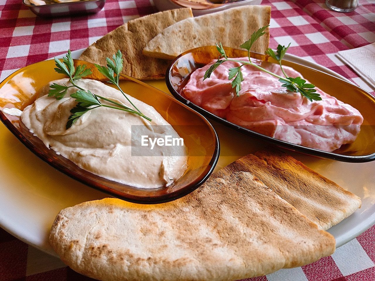 CLOSE-UP OF FOOD ON TABLE