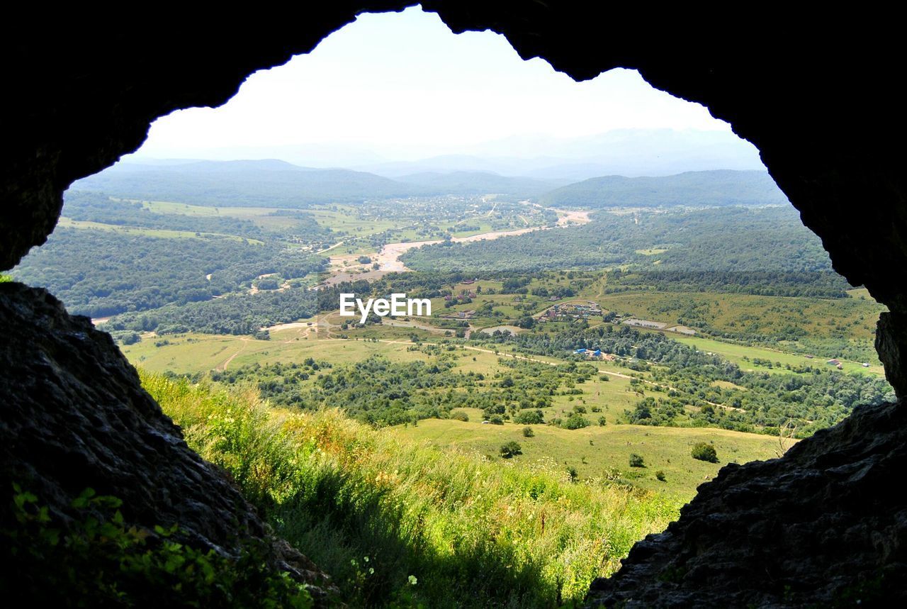 Scenic view of landscape seen from cave