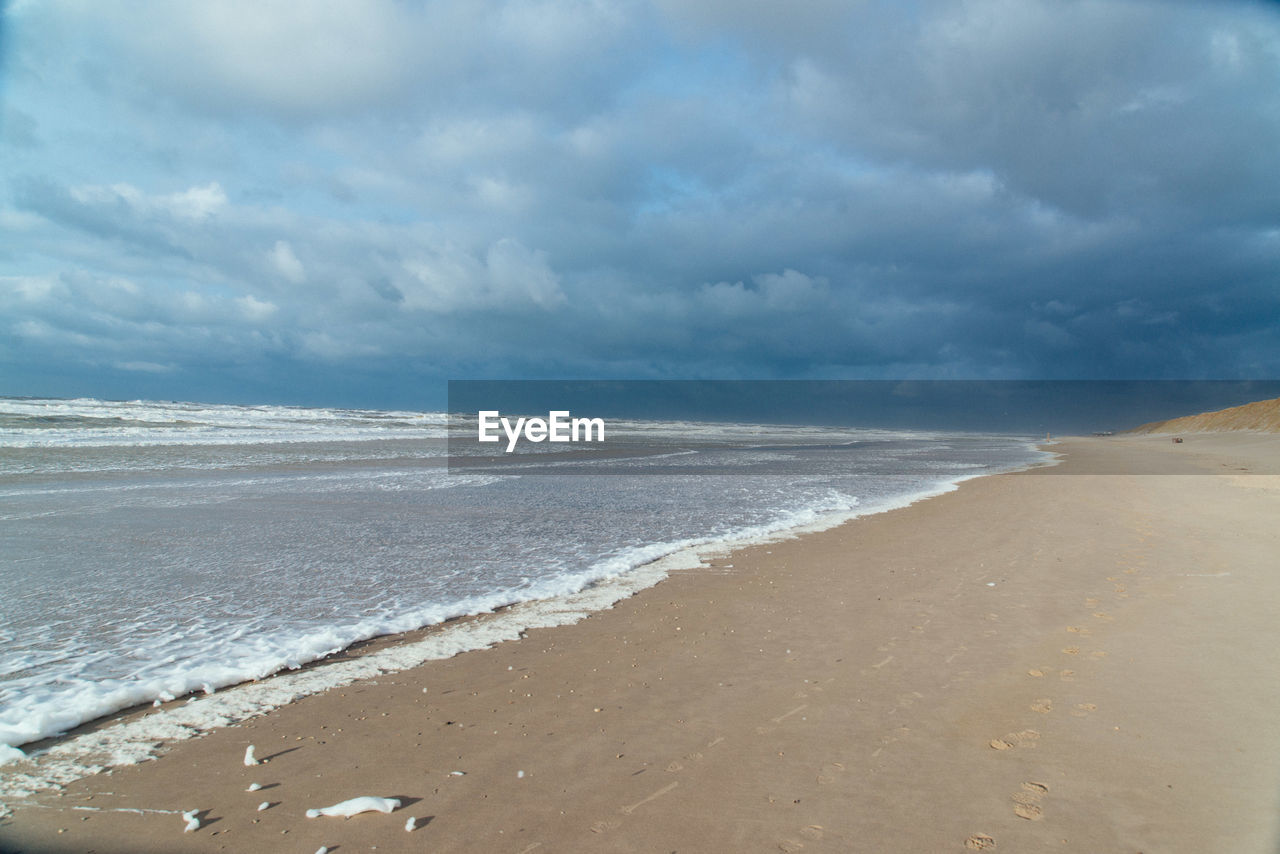 VIEW OF BEACH AGAINST SKY