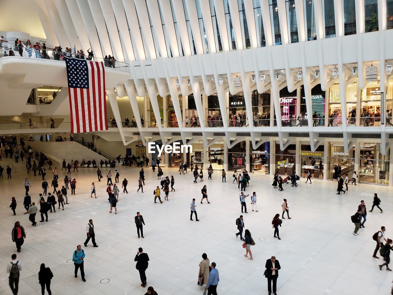 HIGH ANGLE VIEW OF GROUP OF PEOPLE IN CITY