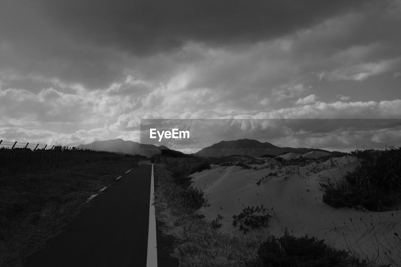 PANORAMIC VIEW OF ROAD BY LANDSCAPE AGAINST SKY