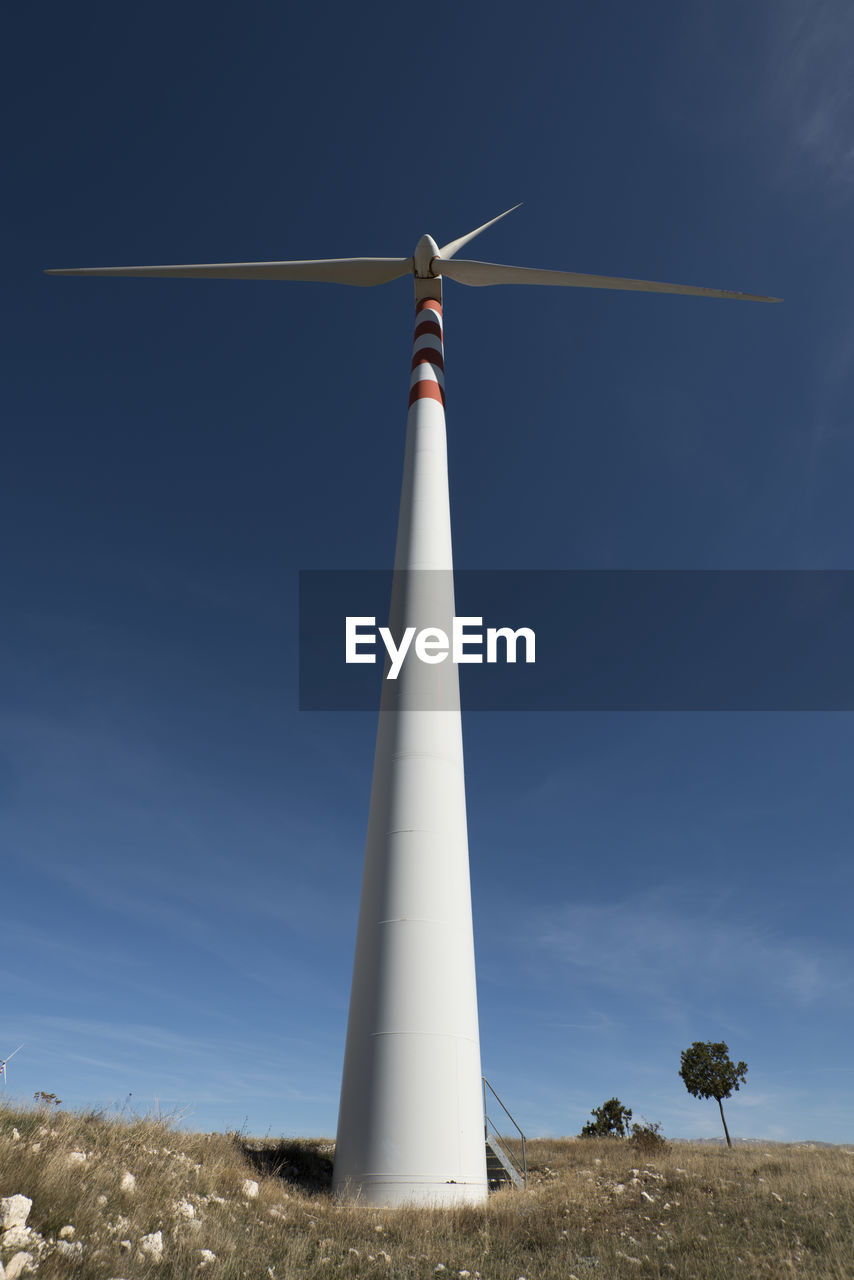 LOW ANGLE VIEW OF WINDMILL AGAINST SKY