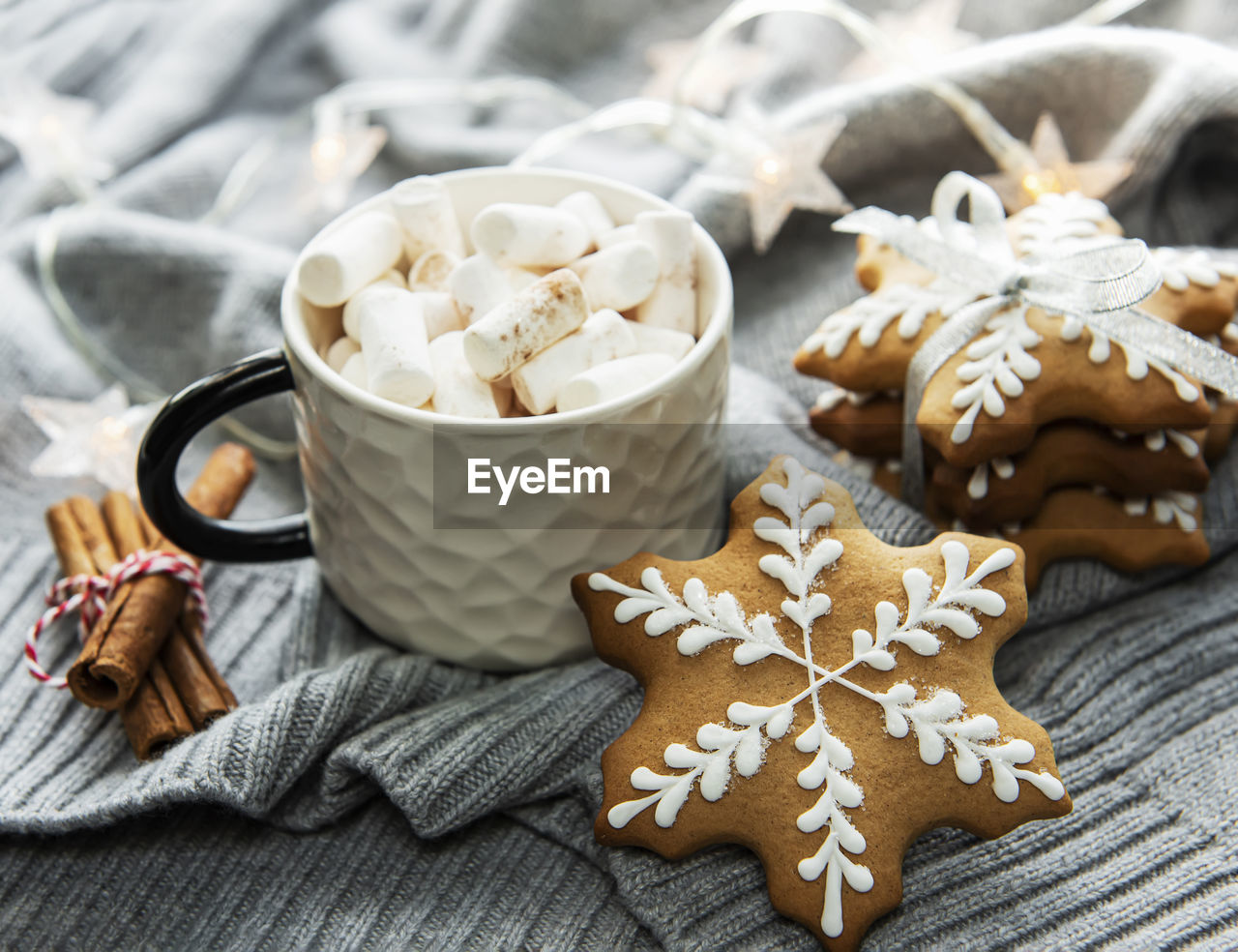 Christmas decorations, cocoa and gingerbread cookies. white wooden background.