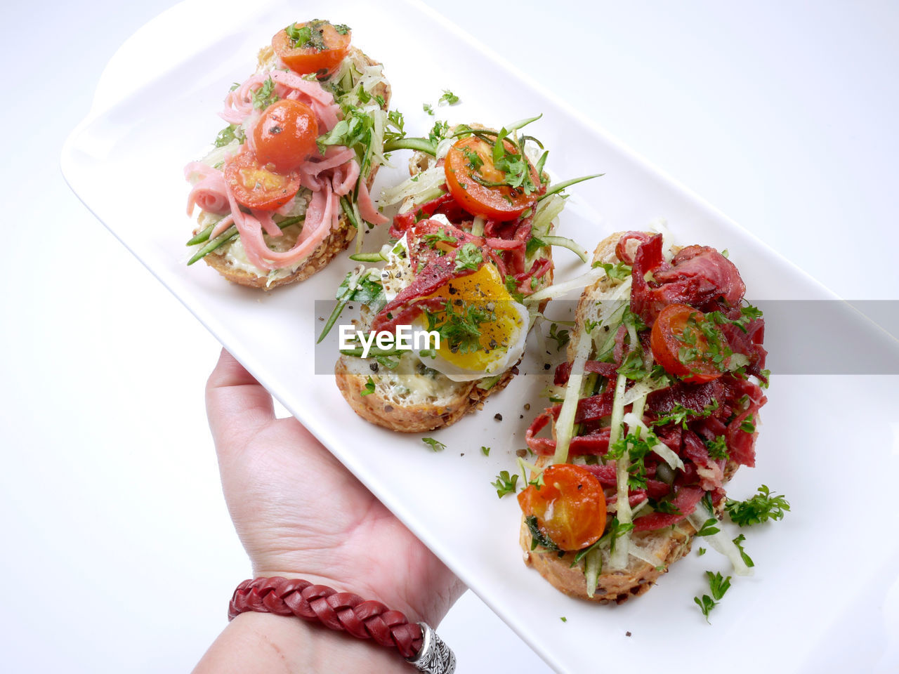 Close-up of hand holding food